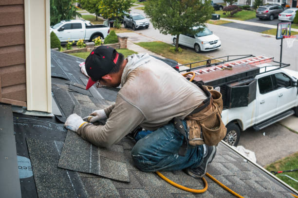 Professional Emergency Roof Repair technician working in New Richland, MN